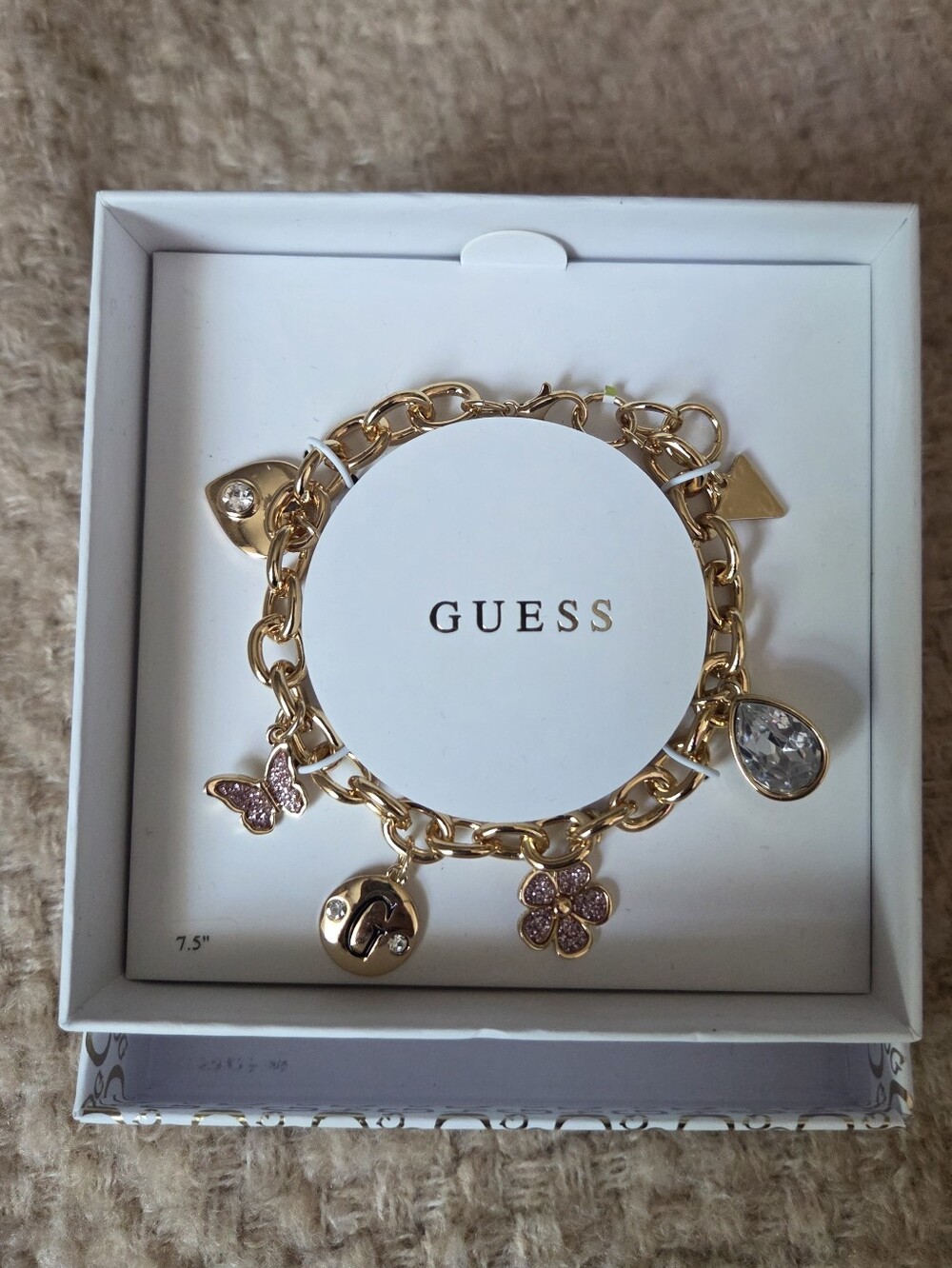 GUESS Gold-Tone Pink Charm Bracelet - Picture 2 of 7